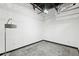 Bright bedroom featuring high ceilings, modern flooring, and a contemporary floor lamp at 5200 Peachtree Rd # 3221, Chamblee, GA 30341
