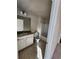 Bathroom with granite countertop and tub shower combo at 2308 Hanover Woods Rd, Lithonia, GA 30058