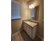 Bathroom with granite vanity and tile floor at 2308 Hanover Woods Rd, Lithonia, GA 30058