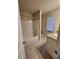 Clean bathroom featuring a tub shower combo and granite countertop at 2308 Hanover Woods Rd, Lithonia, GA 30058