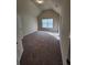 Bright bedroom with vaulted ceiling and carpet flooring at 2308 Hanover Woods Rd, Lithonia, GA 30058
