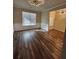 Spacious dining room with hardwood floors and natural light at 2308 Hanover Woods Rd, Lithonia, GA 30058
