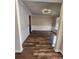 Formal dining room with hardwood floors and wainscoting at 2308 Hanover Woods Rd, Lithonia, GA 30058