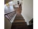 Staircase overlooking the main floor and kitchen at 2308 Hanover Woods Rd, Lithonia, GA 30058