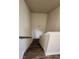 Modern staircase with dark brown wood flooring at 2308 Hanover Woods Rd, Lithonia, GA 30058