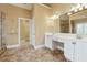 Spacious bathroom featuring double sink vanity with bright lighting and tile floors at 100 Pine Sandy Bank Dr, Canton, GA 30114