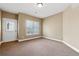 Neutral bedroom with carpet, white trim, and a door to the exterior at 100 Pine Sandy Bank Dr, Canton, GA 30114