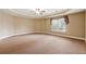 Expansive bedroom with neutral walls, carpeted floors, and a tray ceiling at 100 Pine Sandy Bank Dr, Canton, GA 30114