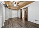 Finished bonus room with wood floors, ceiling and sliding barn door at 100 Pine Sandy Bank Dr, Canton, GA 30114