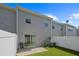 Private fenced backyard features a patio and low-maintenance artificial turf at 2657 Avanti Way, Decatur, GA 30035