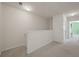 Upstairs hallway with neutral carpet and white trim at 2657 Avanti Way, Decatur, GA 30035
