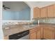 Kitchen features tile backsplash, stainless steel sink and appliances at 2657 Avanti Way, Decatur, GA 30035