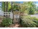 Stone sign at Longview Walk entrance amid lush landscaping at 2657 Avanti Way, Decatur, GA 30035