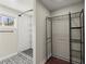 Bathroom shower with a tiled wall and black shelves at 530 Bolton Nw Rd, Atlanta, GA 30331