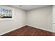 Bright bedroom with hardwood floors and natural light from the window at 530 Bolton Nw Rd, Atlanta, GA 30331