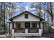 Charming home showcasing a front porch with flower boxes and a well-manicured yard at 530 Bolton Nw Rd, Atlanta, GA 30331