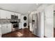 Modern kitchen with stainless steel appliances, stylish backsplash, and ample cabinet space at 530 Bolton Nw Rd, Atlanta, GA 30331