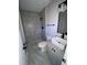 Stylish bathroom showcasing a glass-enclosed shower, granite countertops, modern vanity, and sleek fixtures at 1126 Mainstreet Valley Dr, Stone Mountain, GA 30088