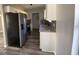 Modern kitchen with stainless steel appliances, granite countertops, and tiled backsplash at 1126 Mainstreet Valley Dr, Stone Mountain, GA 30088