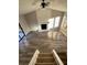 Bright living room featuring hardwood floors, a fireplace, and large windows at 1126 Mainstreet Valley Dr, Stone Mountain, GA 30088
