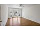 Hardwood floor bedroom with bay window and ceiling fan at 3964 Preston Ne Ct, Brookhaven, GA 30319