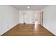 Spacious bedroom with hardwood floors and access to other rooms at 3964 Preston Ne Ct, Brookhaven, GA 30319