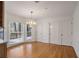 Breakfast room with hardwood floors, built-in shelving, and a view to the back yard at 3964 Preston Ne Ct, Brookhaven, GA 30319