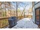 Wooden deck with grill and snowy view at 3964 Preston Ne Ct, Brookhaven, GA 30319