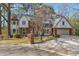 Brick two-story house with a large yard and attached garage at 3964 Preston Ne Ct, Brookhaven, GA 30319
