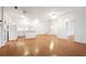 Kitchen with island and white cabinets, hardwood floors at 3964 Preston Ne Ct, Brookhaven, GA 30319