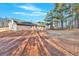 House with a large backyard and trees at 761 Woodwind Dr, Rockmart, GA 30153