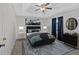 Main bedroom with ceiling fan and ample closet space at 761 Woodwind Dr, Rockmart, GA 30153