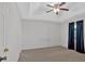 Spacious bedroom with neutral walls and ceiling fan at 761 Woodwind Dr, Rockmart, GA 30153