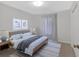 Spacious bedroom with queen bed and large window at 761 Woodwind Dr, Rockmart, GA 30153