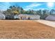 Ranch home with attached garage, situated on a large lot at 761 Woodwind Dr, Rockmart, GA 30153