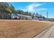 Ranch home with attached garage and expansive yard at 761 Woodwind Dr, Rockmart, GA 30153