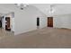 Spacious living room with carpeting and high ceilings at 761 Woodwind Dr, Rockmart, GA 30153