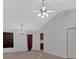 Bright living room with vaulted ceiling and neutral decor at 761 Woodwind Dr, Rockmart, GA 30153