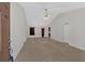 Spacious living room with vaulted ceiling and neutral carpeting at 761 Woodwind Dr, Rockmart, GA 30153
