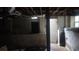 Basement area showing block foundation and access door, ready for storage or renovation at 126 Meadow Park Sw Ln, Atlanta, GA 30315