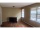 Bedroom featuring a desk, hardwood floors, and two bright windows at 126 Meadow Park Sw Ln, Atlanta, GA 30315