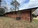 Brick wall with air conditioning unit and landscaping at 126 Meadow Park Sw Ln, Atlanta, GA 30315