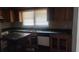This kitchen offers a sink, dishwasher, and wooden cabinets at 126 Meadow Park Sw Ln, Atlanta, GA 30315