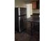 Kitchen featuring stainless steel refrigerator and dark wood cabinets at 126 Meadow Park Sw Ln, Atlanta, GA 30315