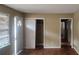 View of a living room featuring hardwood floors and front door at 126 Meadow Park Sw Ln, Atlanta, GA 30315