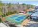 Aerial view of tennis courts, swimming pool, and other community amenities at 216 Meadow Run, Carrollton, GA 30116