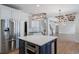 Modern kitchen with stainless steel appliances and island at 2181 Ivey Creek Way, Stone Mountain, GA 30087