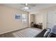 Cozy bonus room with a sleeper sofa and a ceiling fan at 849 Hillandale Ln, Lithonia, GA 30058