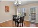 Dining area with four chairs and access to a deck at 849 Hillandale Ln, Lithonia, GA 30058