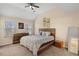 Spacious main bedroom with high ceiling, large bed, and ample closet space at 849 Hillandale Ln, Lithonia, GA 30058
